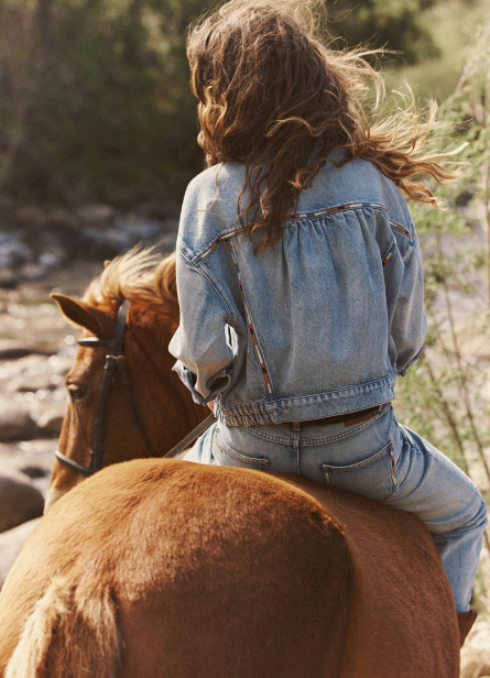 Woman riding a horse