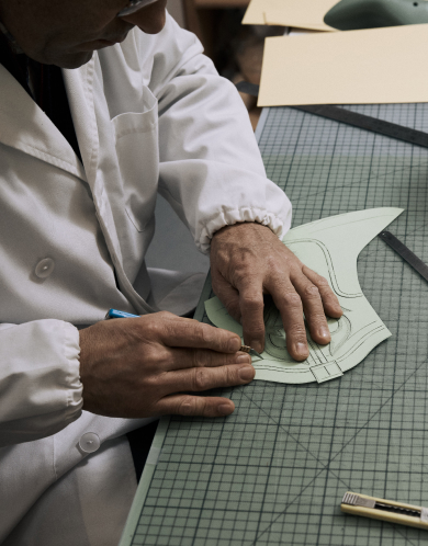 Designer sketching the caitlin boots
